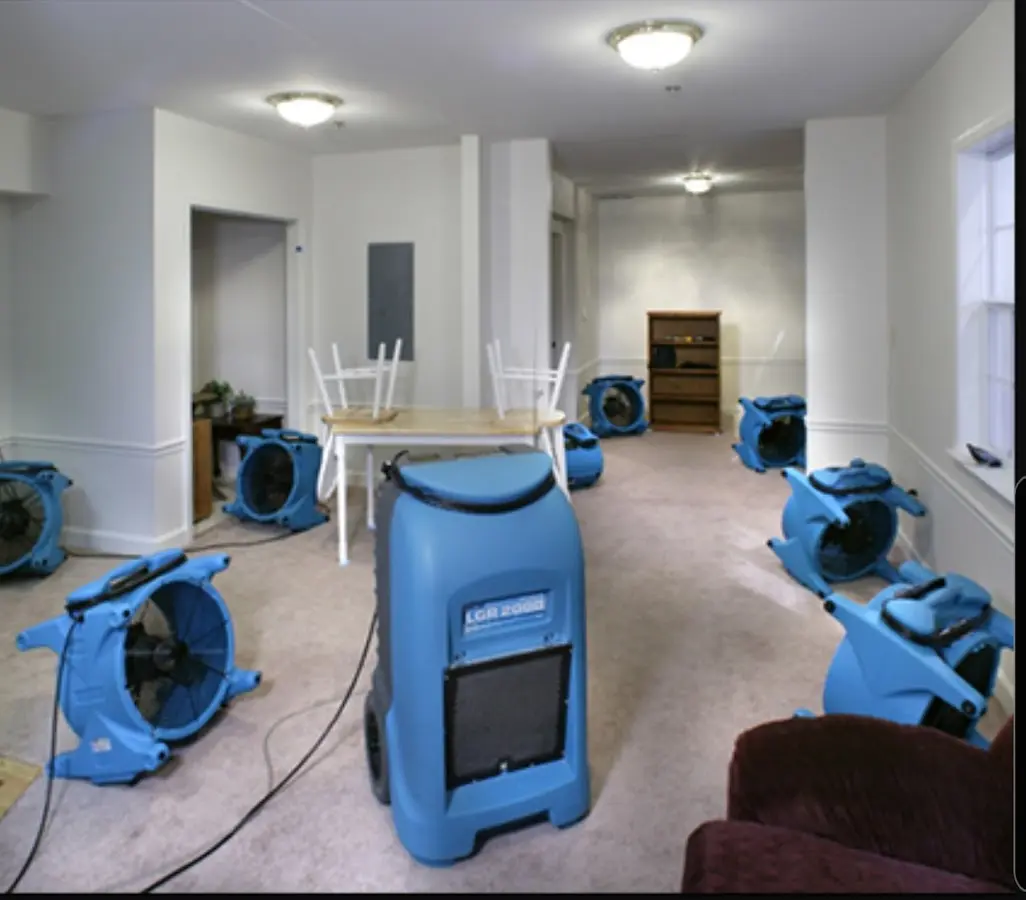 Air movers and dehumidifier setup for Water Damage Restoration in Exeter